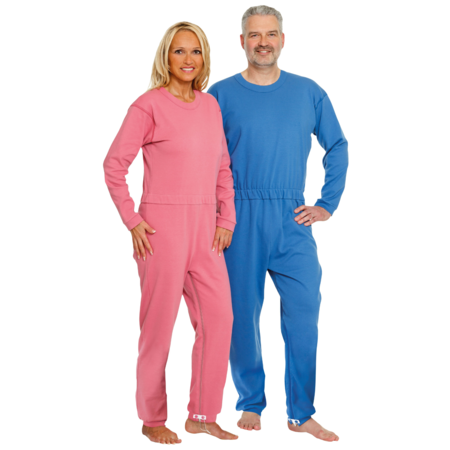 Frau und Mann tragen Suprima Pflegeoverall lang CareBasic 4688